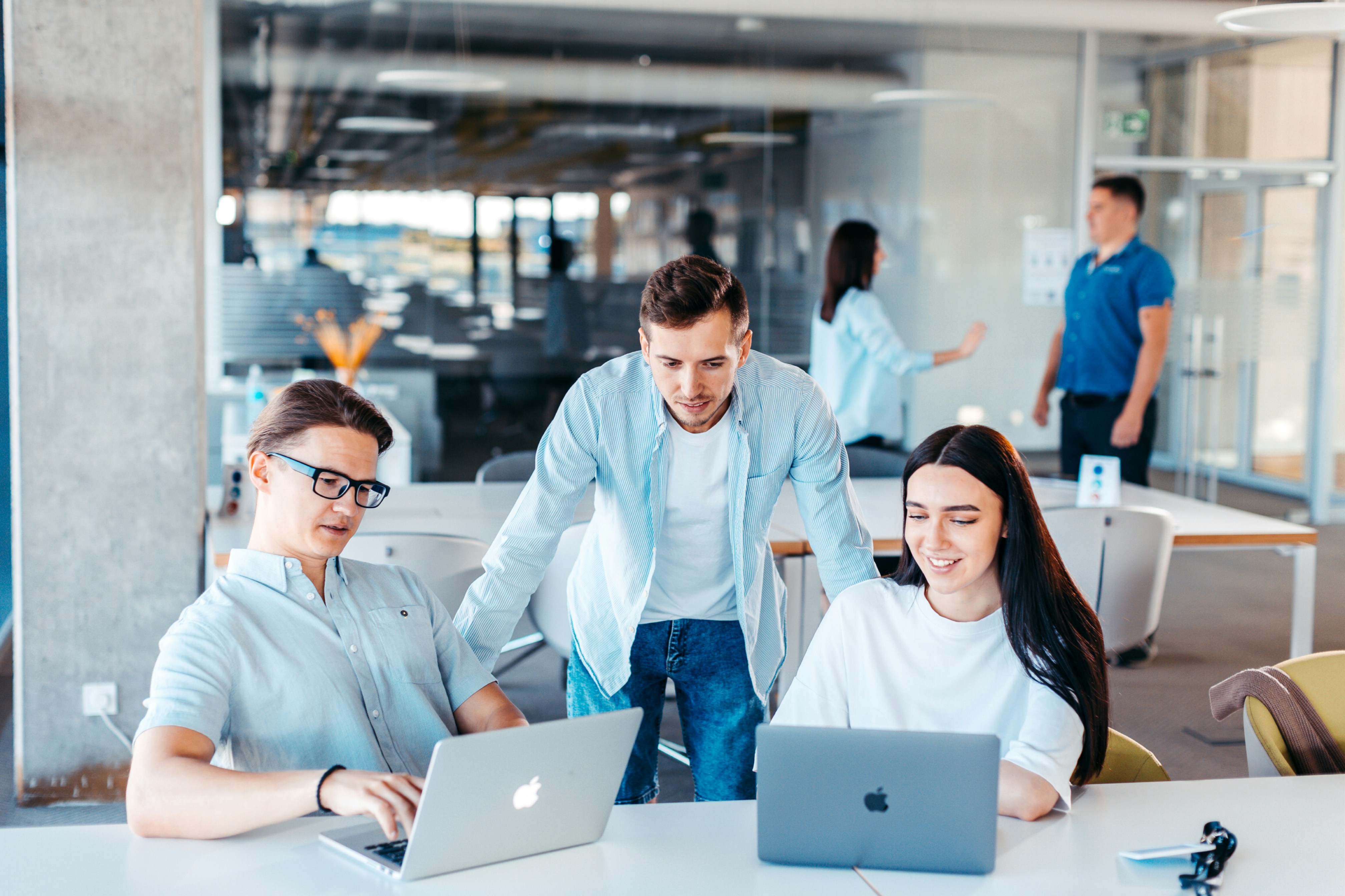 Professional team collaborating on AI technology projects